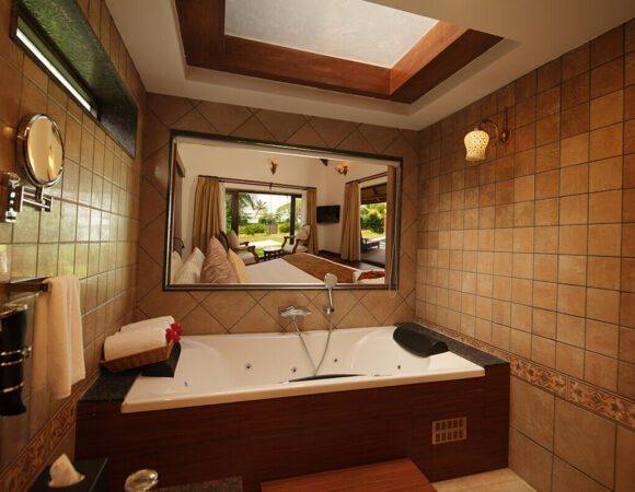 Bathtub in private pool villa at Gokulam Kumarakom