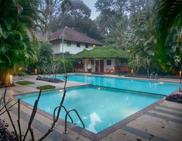 Swimming pool with kids pool in Greenwoods resort Thekkady