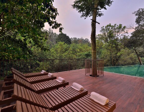 Infinity pool in Abad Brookside Wayanad- premium resort