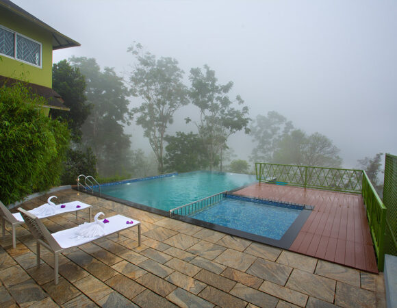 Swimming pool at Amrezy resort Wayanad