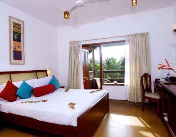 Garden view room in Estuary Sarovar Portico Poovar