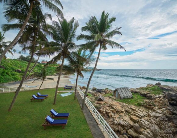 Rockholm at the light house beach - best for Kovalam trip