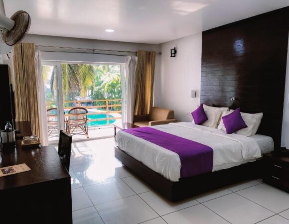 Premier pool view room in malabar ocean front resort