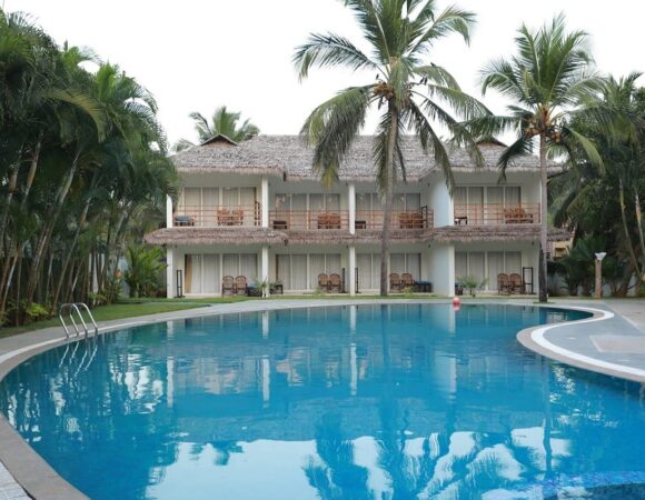 Premier pool view room in malabar ocean front resort & spa