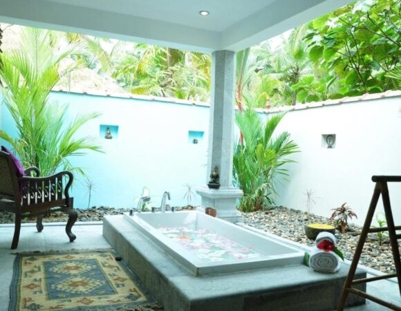 bathtub in Sea View cottage at Neeleshwar hermitage hotel