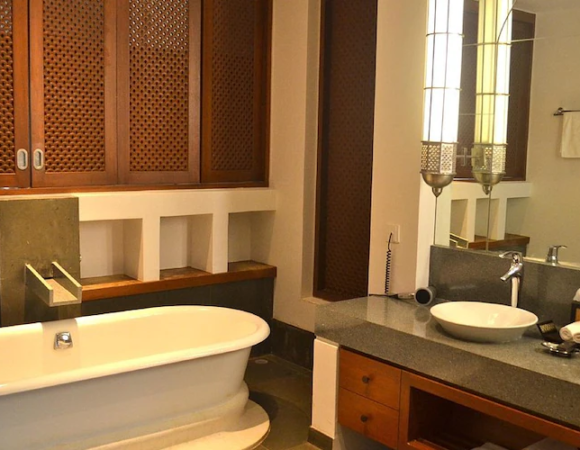 Bathtub in Superior room with private sit out at Taj Bekal