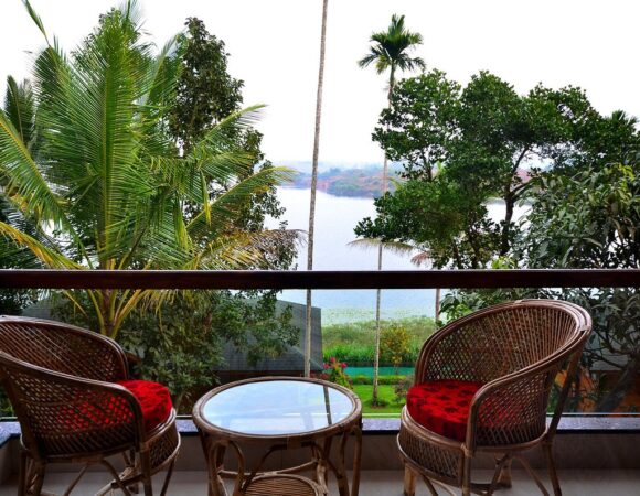 Balcony of superior lakeview room in Lakerose Wayanad resort